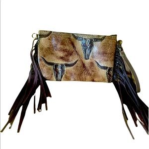 Brand new clutch 100% leather